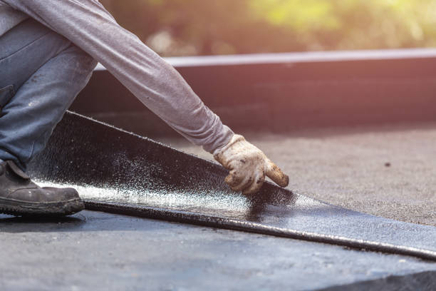 Professional Basement Waterproofing technician working in Bowling Green, IN